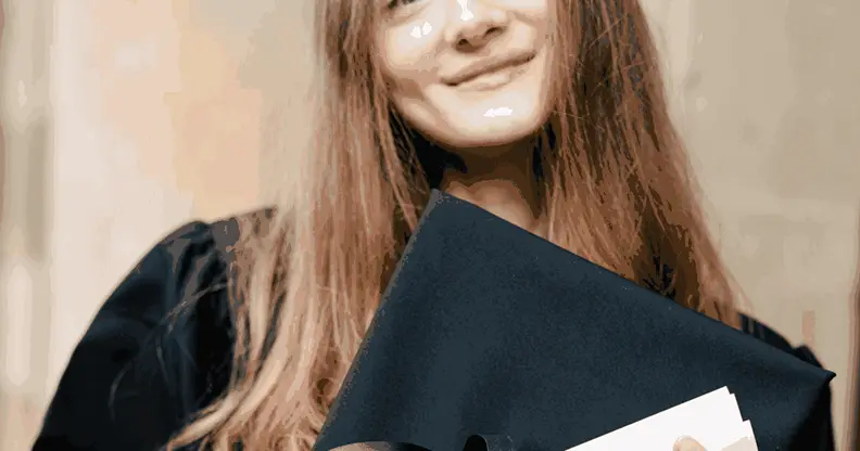 Smiling graduate holding a certificate, representing eligibility for the artificial intelligence and machine learning course