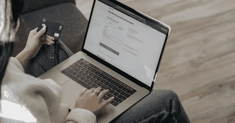 Student reviewing the Nexton AI course fee and EMI payment options on a laptop